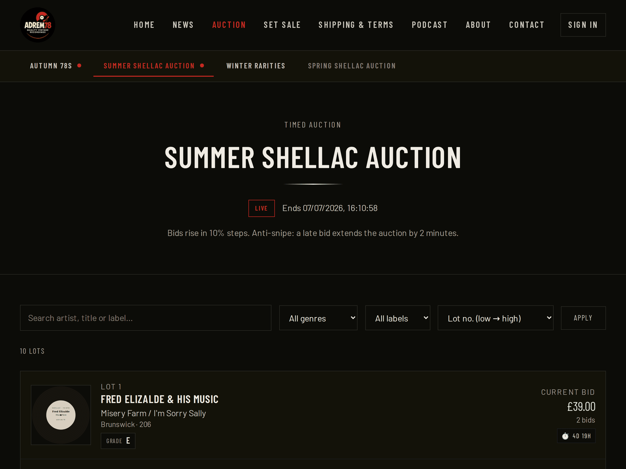 The auction list, showing several records with photographs, titles and current bids.